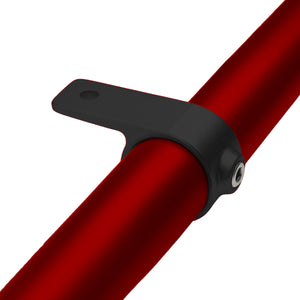 Single lugged mounting bracket attached to pipe.