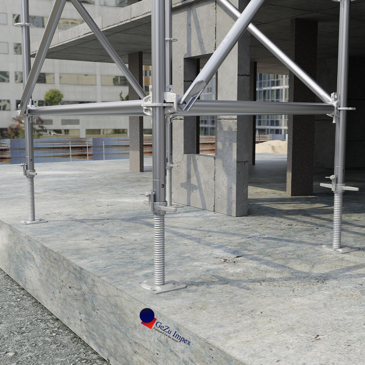 Adjustable screw base jack supporting the bottom of a scaffolding structure.