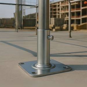 Scaffold base plate securing the scaffolding framework to the ground.